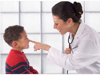 pediatrician treating a patient
