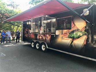 food trailer with red awning 