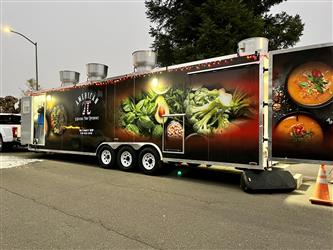 food trailer with red awning 